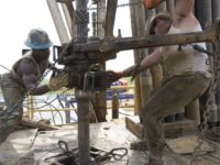 Deck hands tighten sections of steel pipe and insert them back into a well on a natural gas drilling rig outside of Artesia, in eastern New Mexico, which is part of the Permian Basin that extends into the state to the west of Texas.
Robert Nickelsberg | Getty Images News | Getty Images