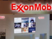 FILE PHOTO: Logos of ExxonMobil are seen in its booth at Gastech, the world's biggest expo for the gas industry, in Chiba, Japan April 4, 2017. REUTERS/Toru Hanai/File Photo