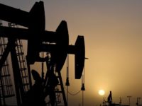 FILE PHOTO: Pump jacks operate at sunset in Midland, Texas, U.S., February 11, 2019. REUTERS/Nick Oxford/File Photo