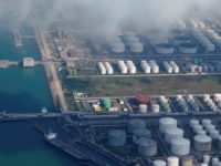 FILE PHOTO: Oil and gas tanks are seen at an oil warehouse at a port in Zhuhai, China October 22, 2018. REUTERS/Aly Song/File Photo