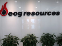 FILE PHOTO: The logo of U.S. oil and gas company EOG Resources is seen in its office in Chongqing, China December 15, 2017. REUTERS/Chen Aizhu